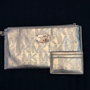 Michael Kors Metallic Silver Clutch and Card Holder
Including Both!